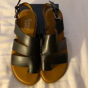 Slightly worn women’s Franco Sarto black leather sandals.